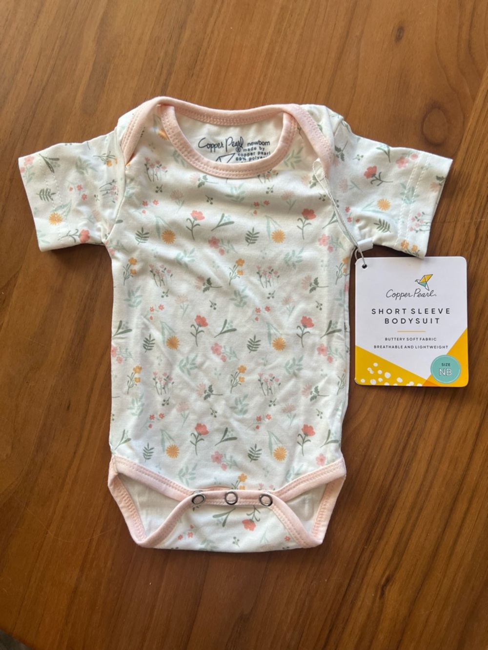 Copper Pearl Mabel onesie